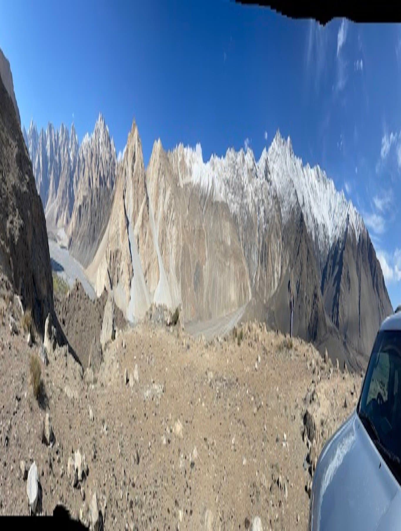 Panoramic view of the jagged Passu Cones rock spires in Gilgit-Baltistan